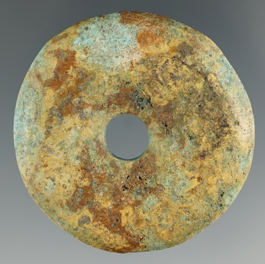 1 3/4" colorful drilled turquoise bead found in the Southwest.