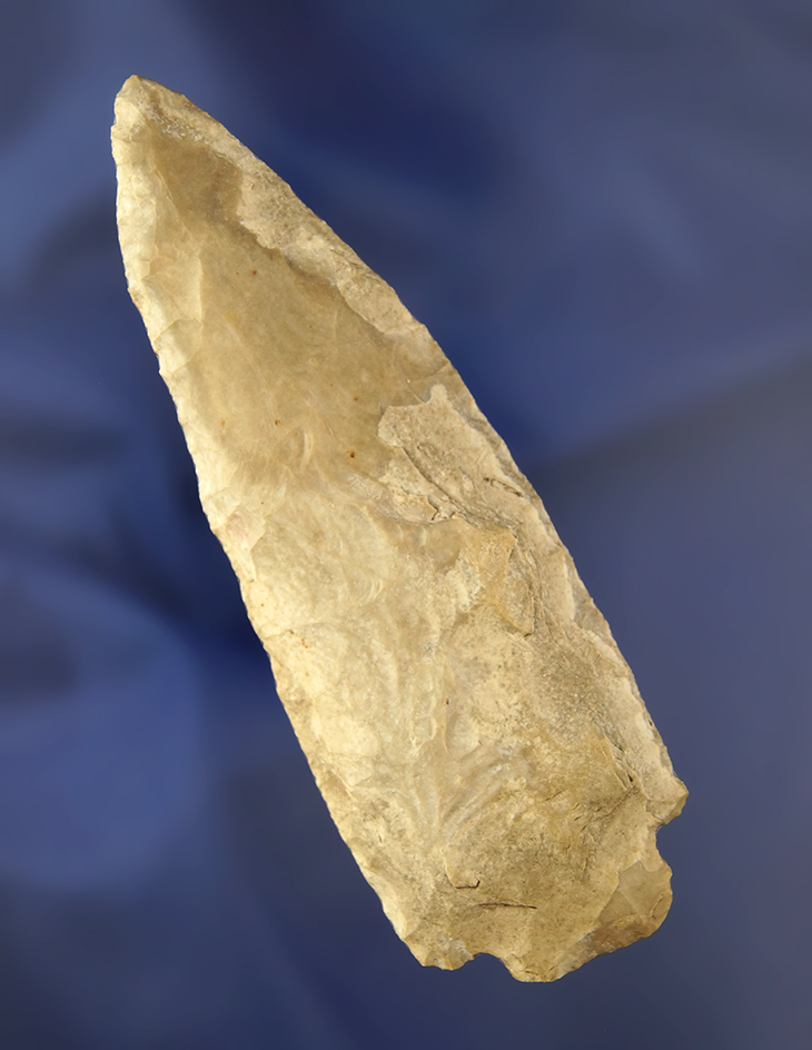 Heavily patinated 4 9/16" base Tang knife found in Texas.