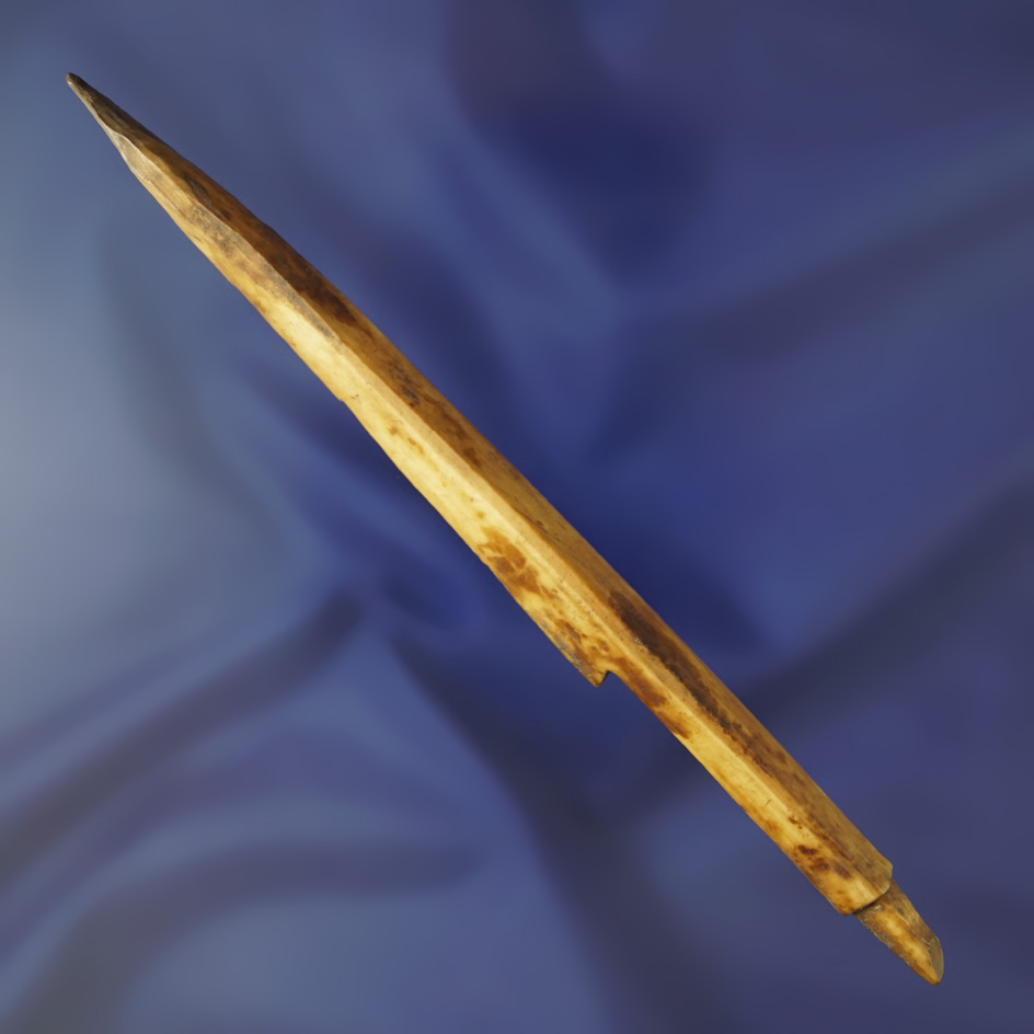 6 1/16" nicely patinated and well styled bone harpoon tip found in Alaska.
