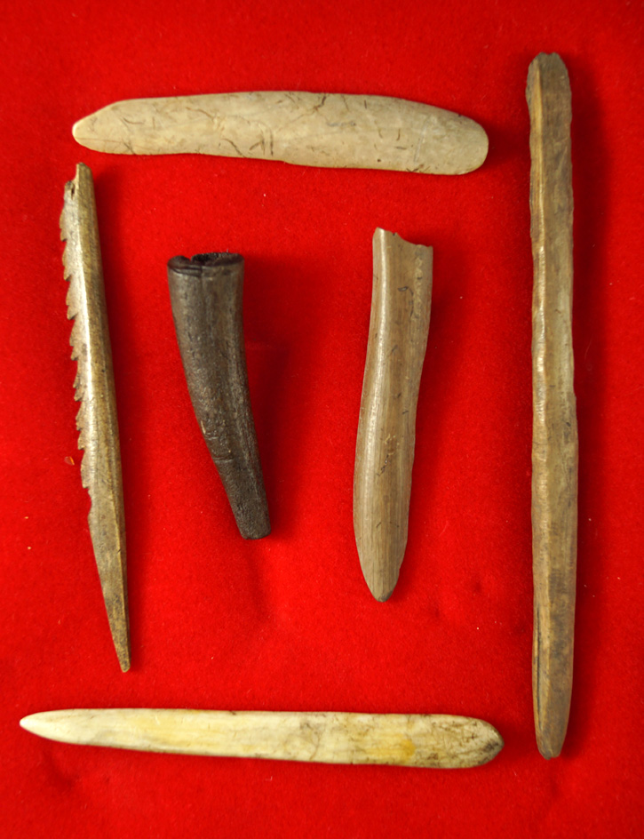 Group of six bone and antler artifacts that were found near Burns Oregon in a cave dig in 1942.