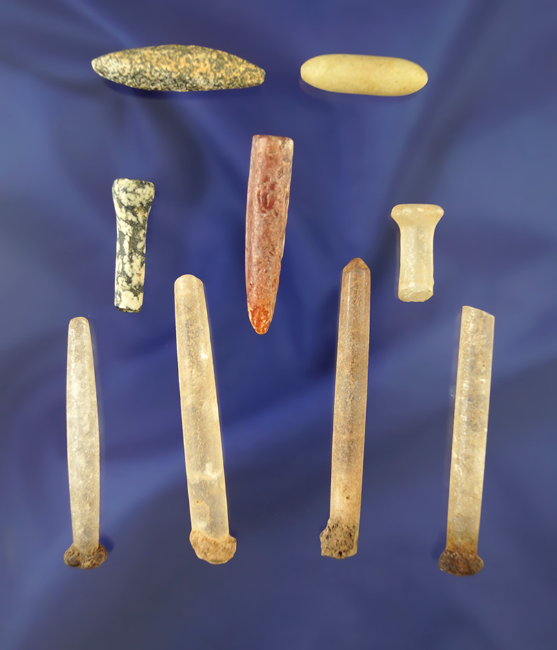 Unique set of nine assorted stone tribal African ornaments. Largest is 2 1/4".