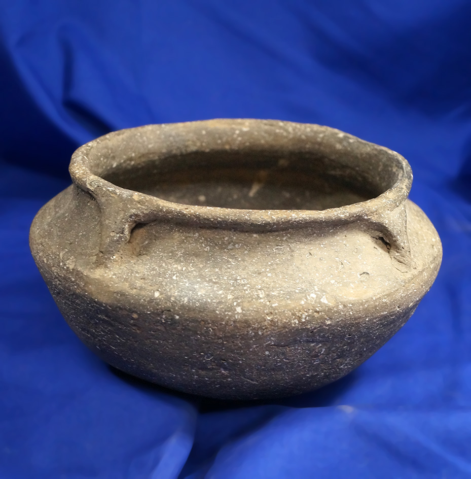 6" wide nicely styled Mississippian bowl with a nicely decorated rim found in Arkansas.