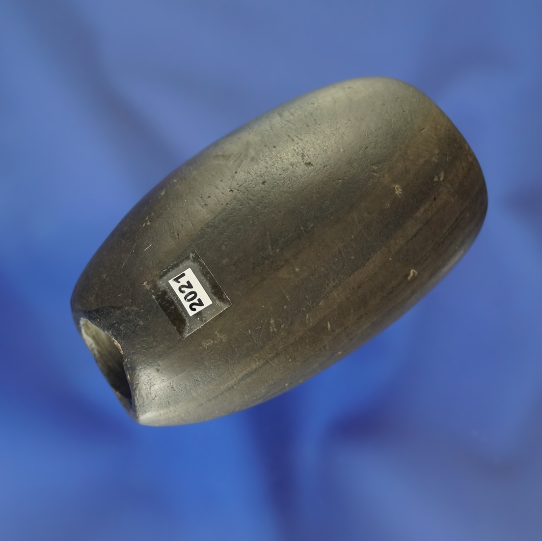 2 5/8" Fluted Tube Bannerstone found in Ashland Co., Ohio. Elleman.