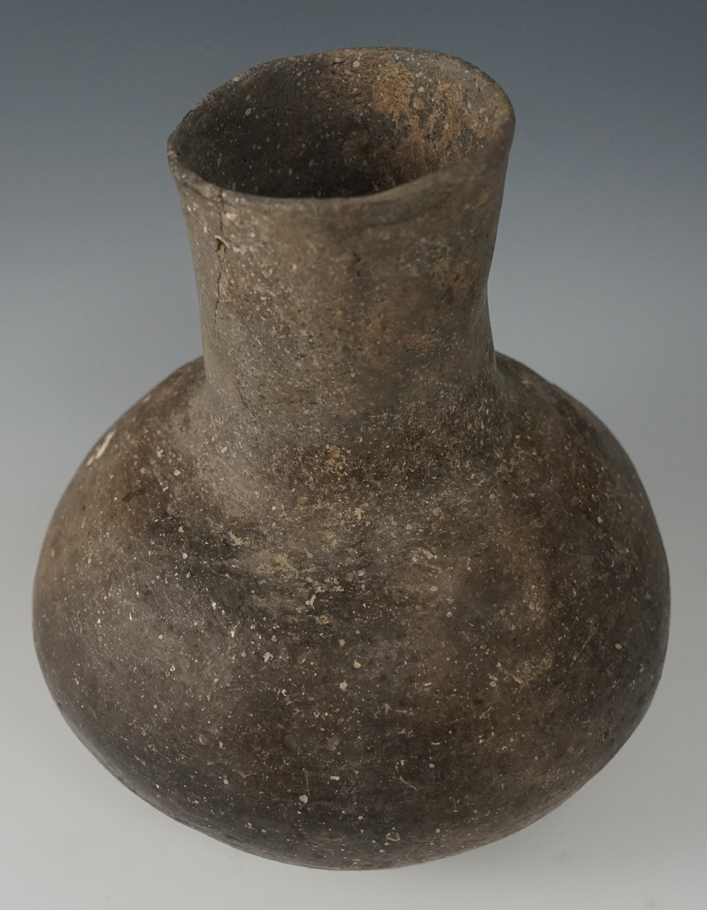 6 1/2" tall Mississippian shell tempered clay water bottle found in Cross Co., Arkansas.