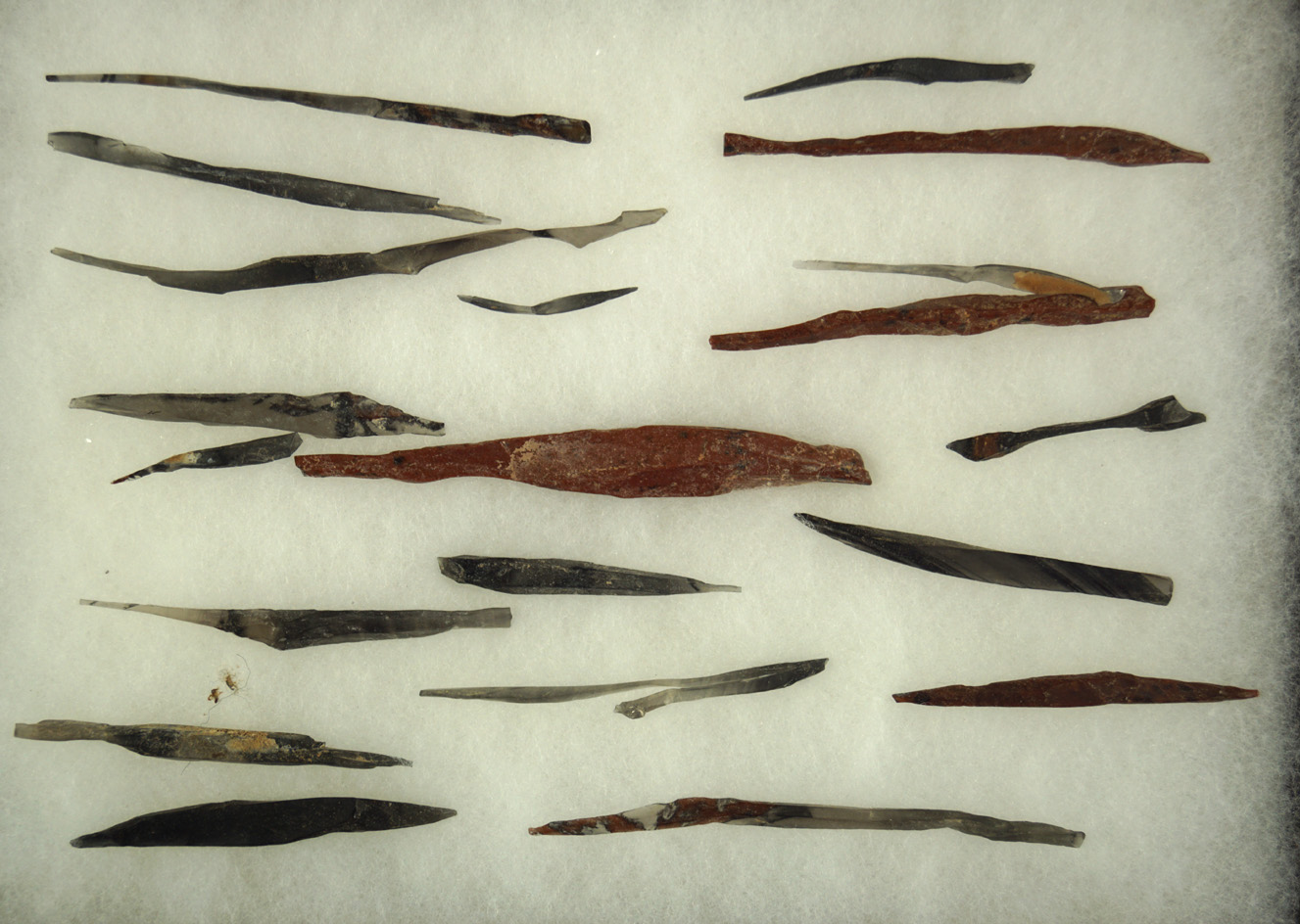Set of approximately 22 pre-Columbian obsidian flaked needles found in Mexico. Largest is 3 1/4".