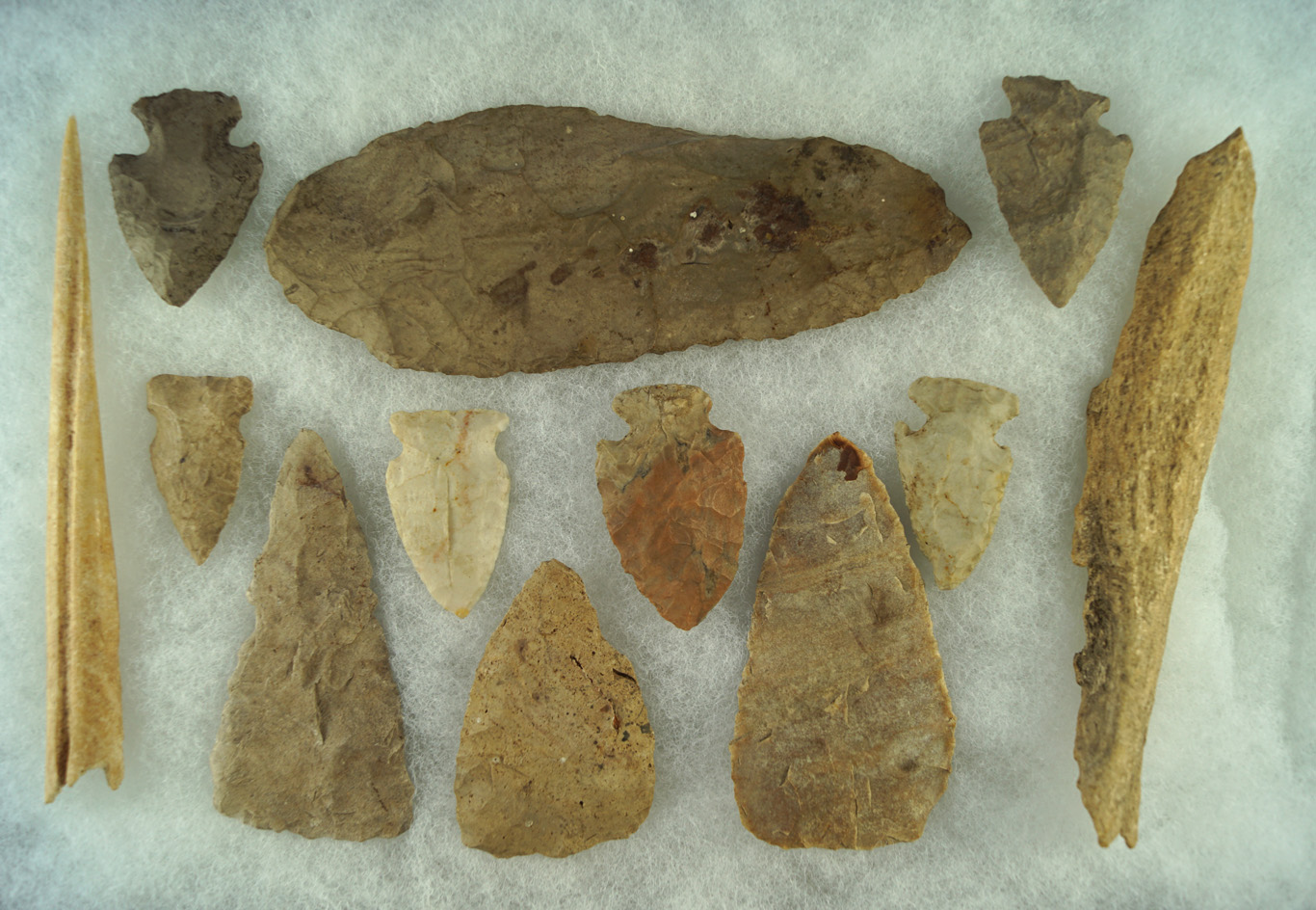 Group of 10 Flint Arrowheads and Bone Artifacts found in Michigan, largest is 5 1/2". Ex.  Waigel.