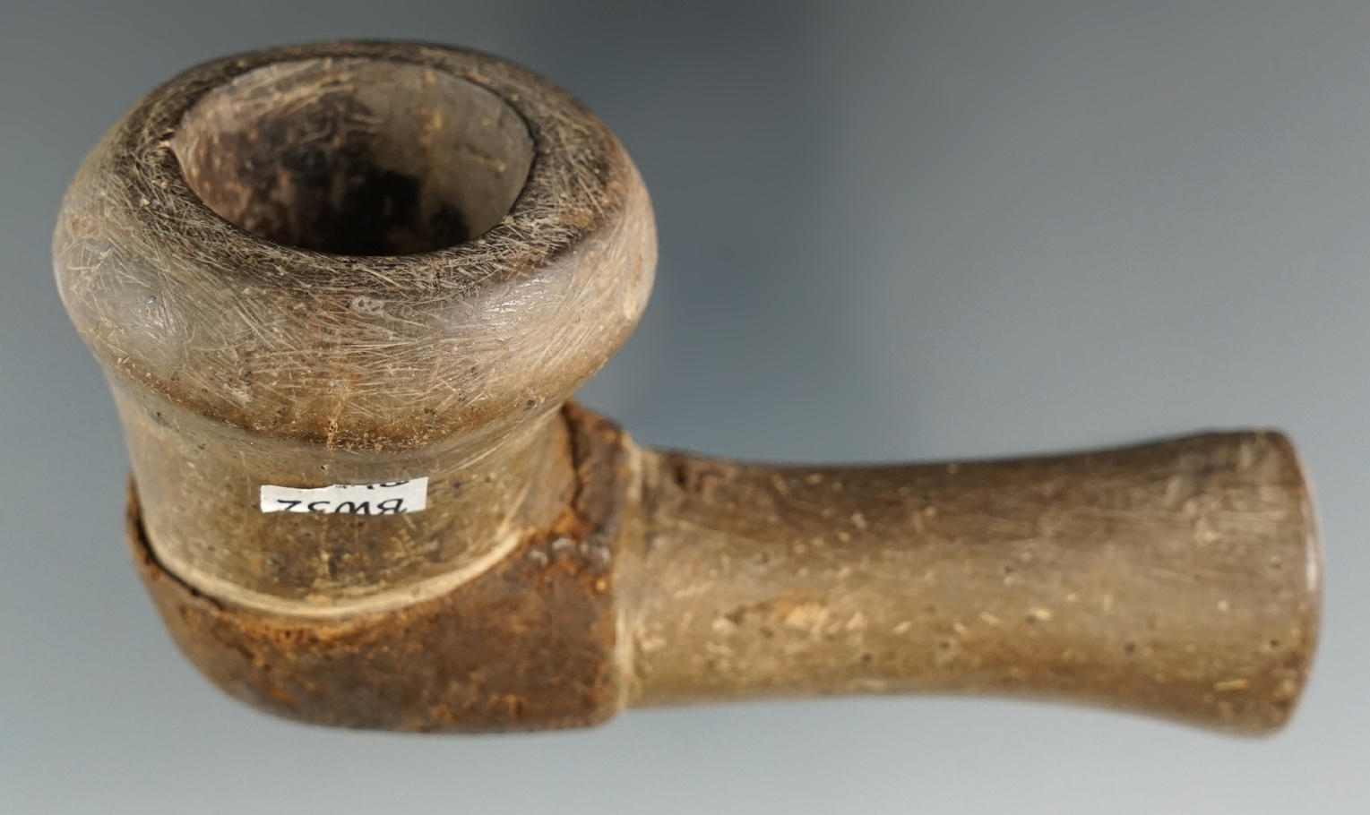 4 1/4" Aboriginal clay pipe in very nice condition. Exact area of origin unknown.