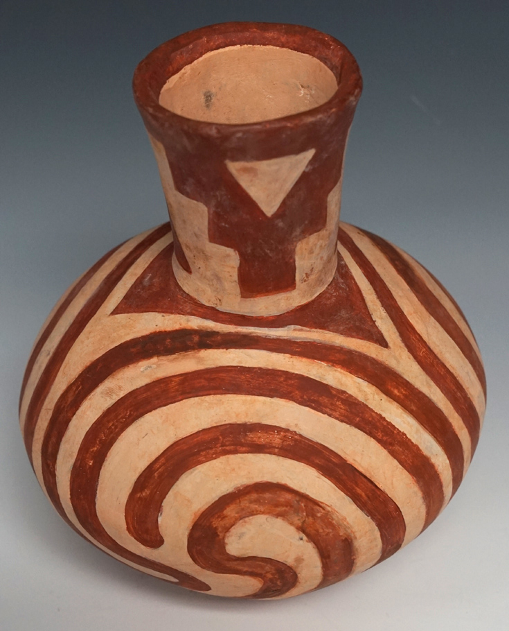 7 1/2" tall red & white swirl bottle found in Mississippi Co., Arkansas. Restored and repainted