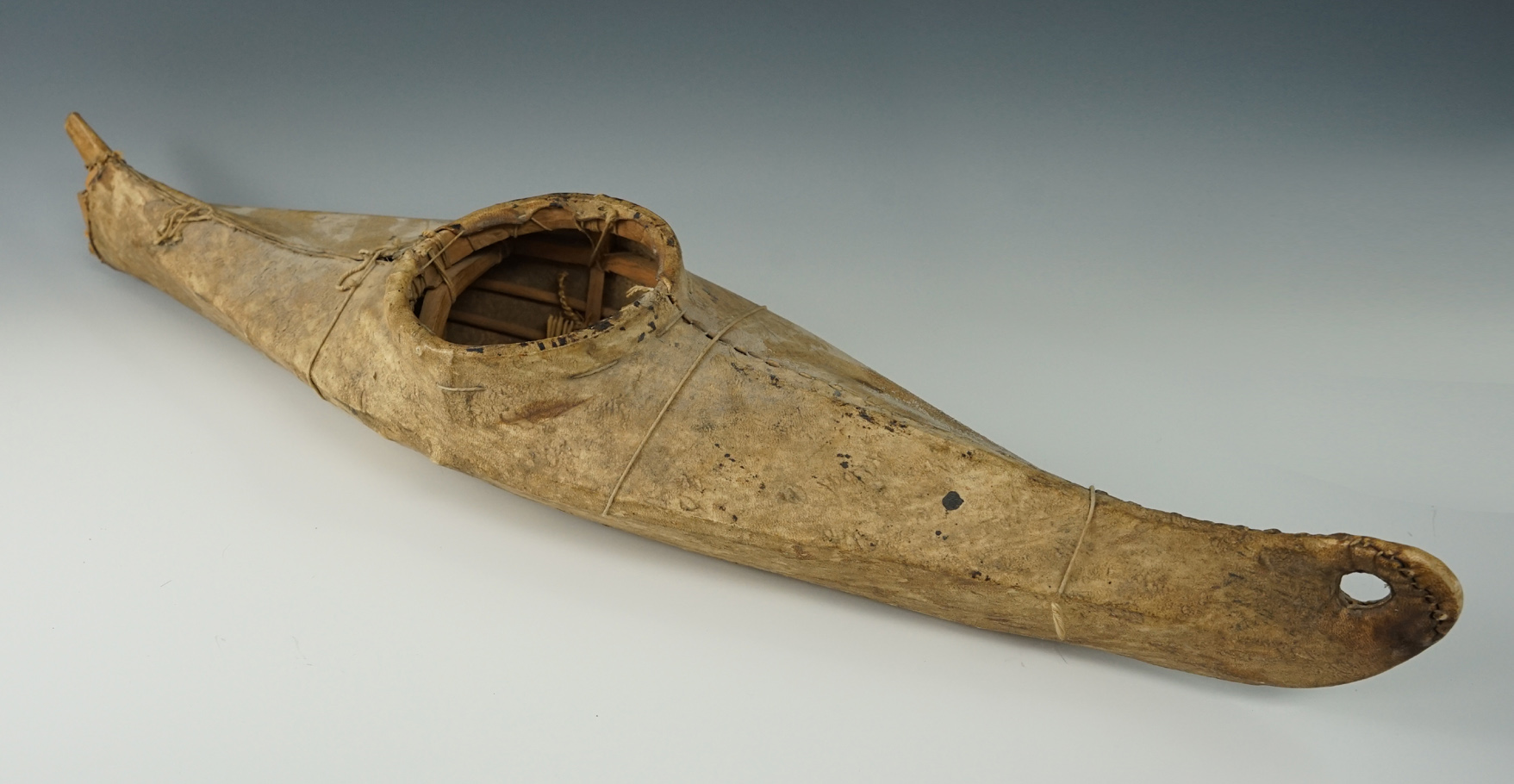 Large 24" Long Inuit vintage Kayak made from leather and wood from Alaska.