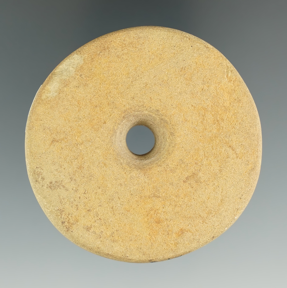 2 3/8" well styled perforated Fort Ancient Disk found in Kentucky. Ex. Henry English Collection.