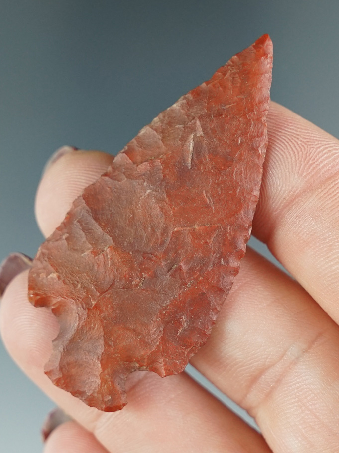 Thin and well patinated! Beautiful flaking in style on this 2 1/8" point found in Wyoming.