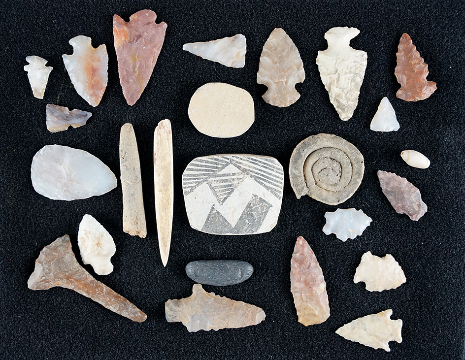 Group of assorted artifacts including Flint, pottery and bone found in Arizona. Largest is 2 3/8".