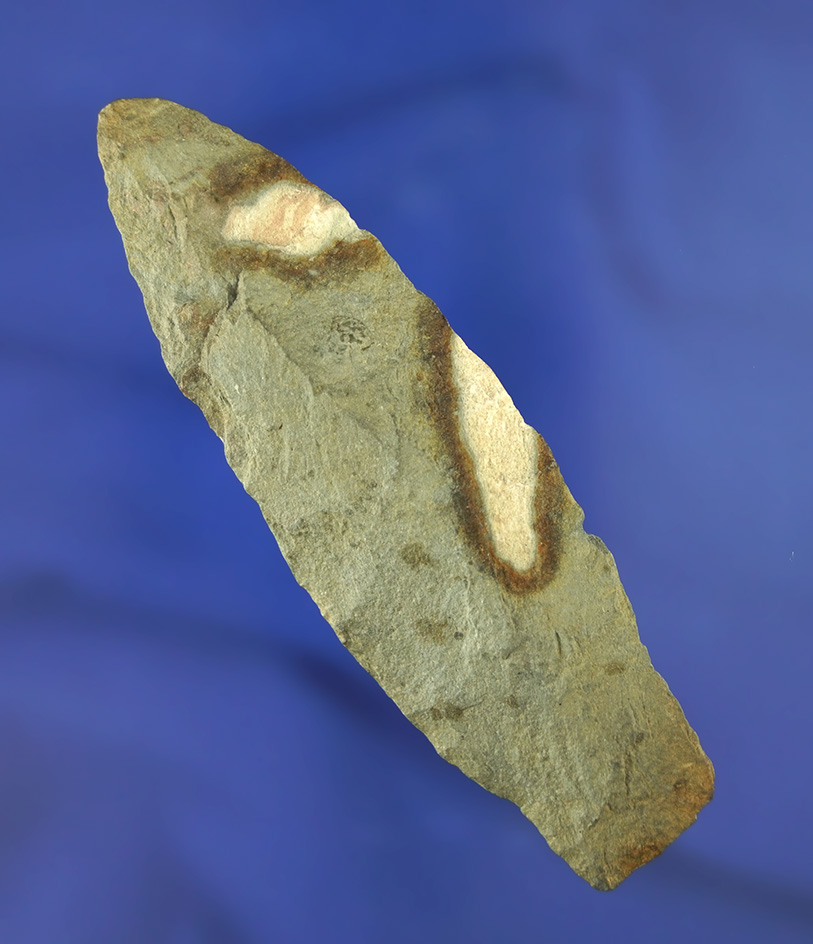 3 7/8" Paleo Stemmed Lanceolate with nicely ground lower edges found in Michigan.