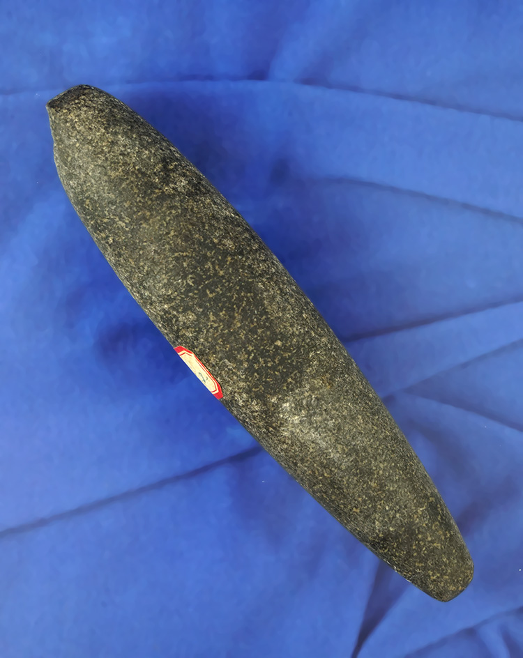 Large 5 1/4" ungrooved Plummet or Charmstone that is nicely polished found in Huron Co.,  MI.