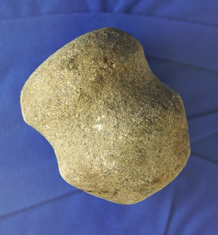 Well defined 2 7/8" long 3/4 grooved Hammerstone found in Michigan.