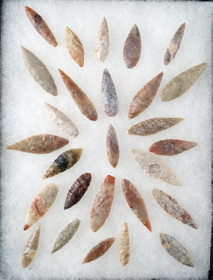 Nice set of African Neolithic leaf points found in the northern Sahara desert region.