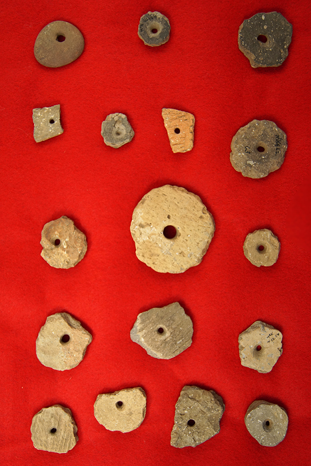 Group of drilled Ft. Ancient Pottery Beads, largest is 2" diameter found in Greenup Co., Kentucky.