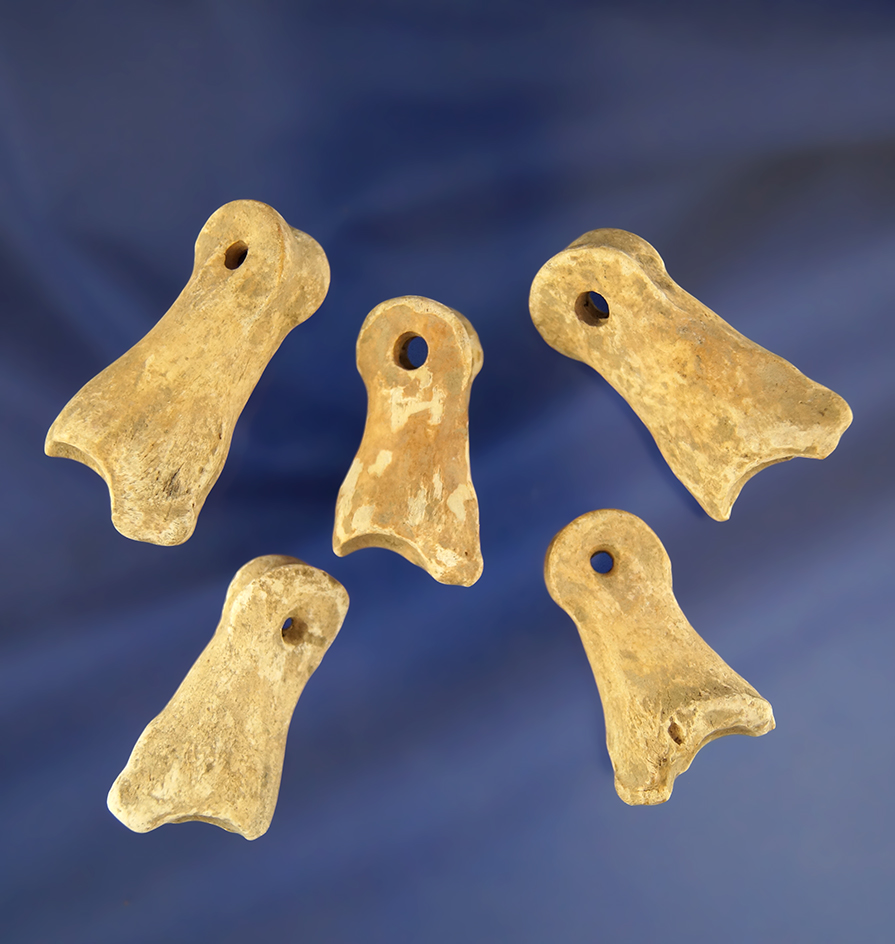 Set of five dear toe bone drilled ornaments found in Mason County Kentucky. Pictured