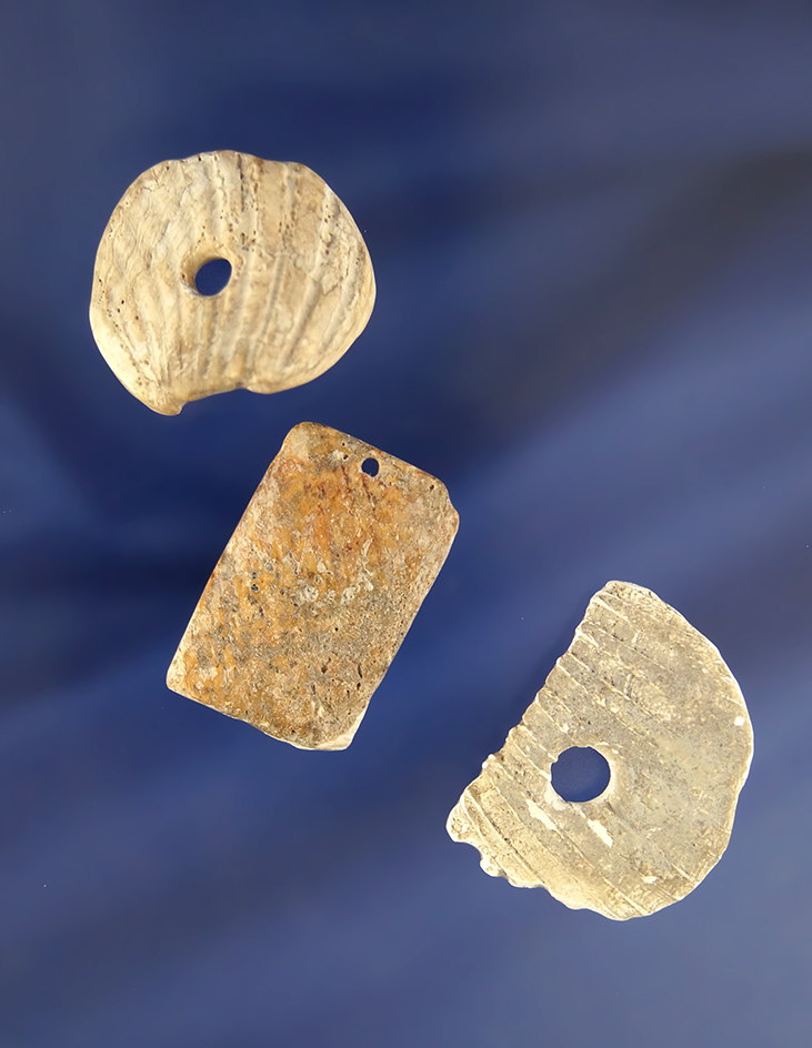 Set of three drilled shell Pendants from the necklace, largest is 1 1/4". Pictured