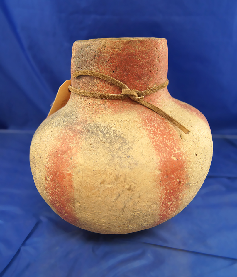 6" by 6 1/2" Red and Buff Bottle found in Mississippi County Arkansas at the Crosskno site. Pictured