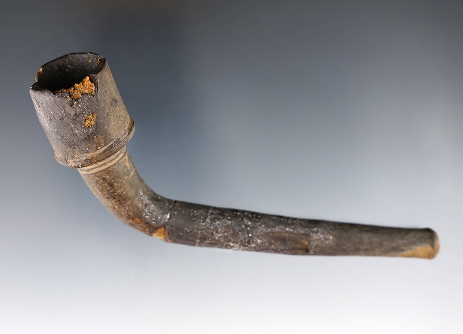 5 3/16" Iroquois pipe. Stem is glued in 2 places with some restoration to bowl. New York.
