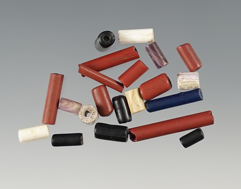 Group of 21 assorted trade beads and wampum. NY. Ex. Gregory Perino. Largest is 3/4".