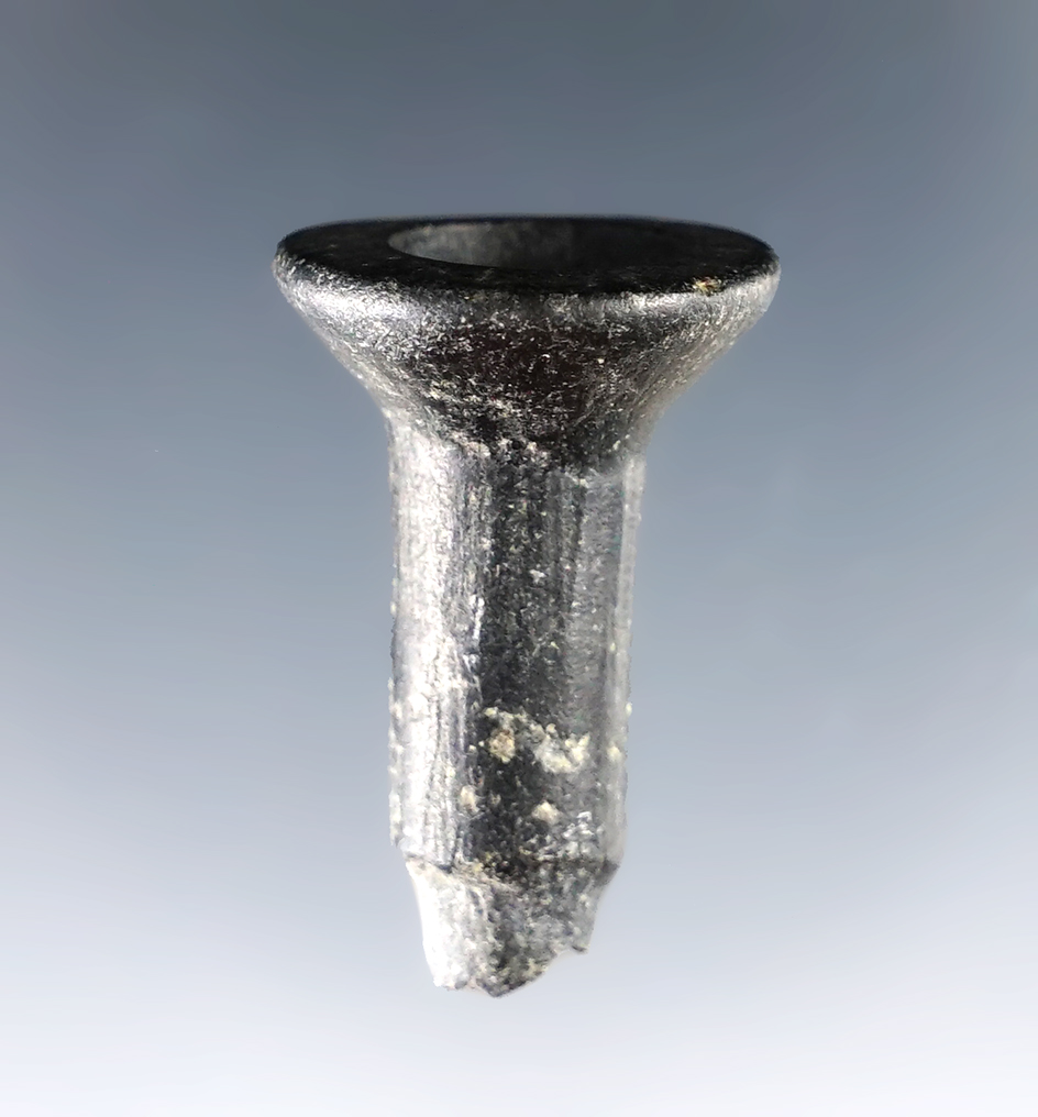  1/4" nicely styled polished stone pre-Columbian facial ornament in nice condition.