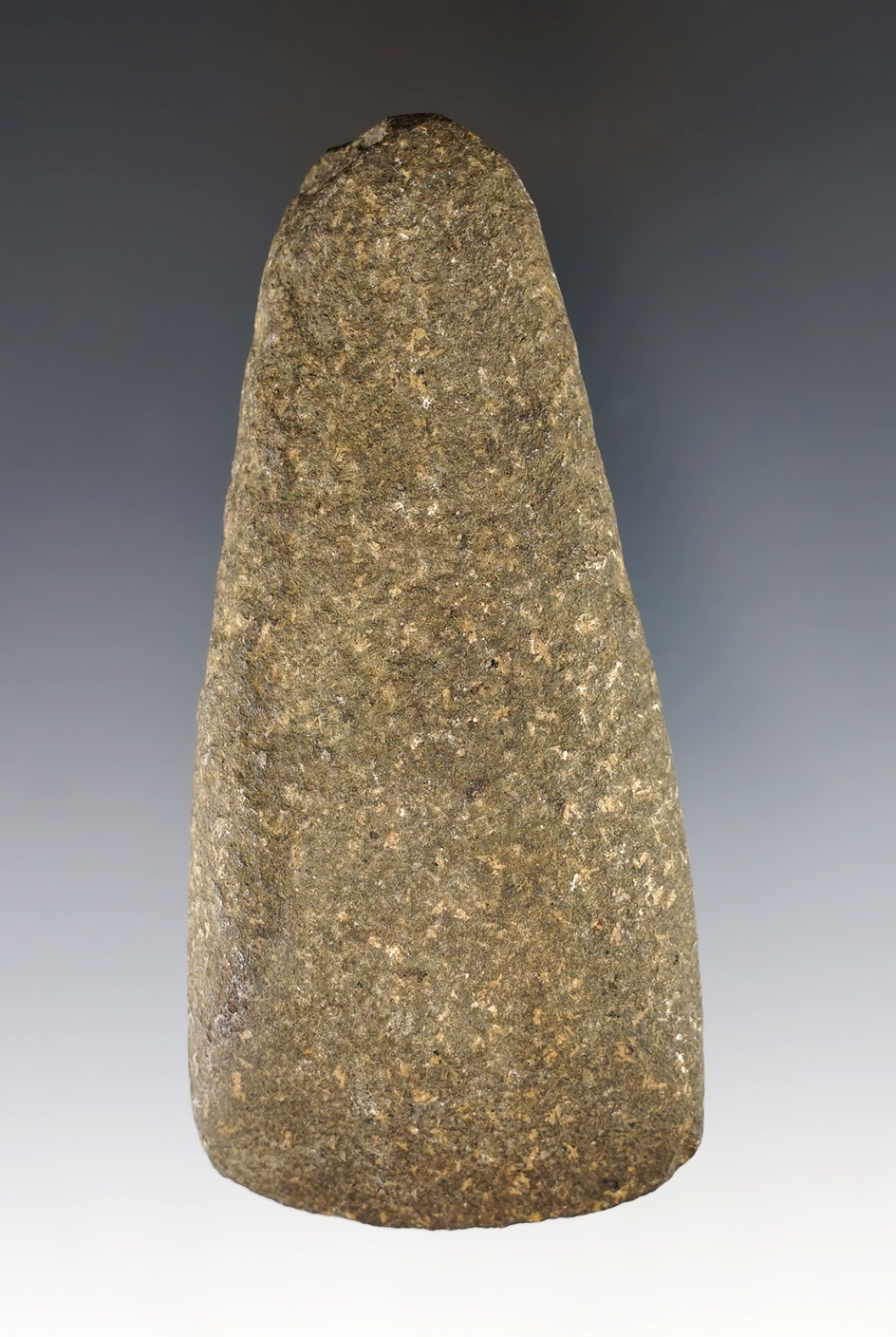 4 1/2" nicely made Hardstone Celt. There is very old tag on it that reads "Indian Hatchet"