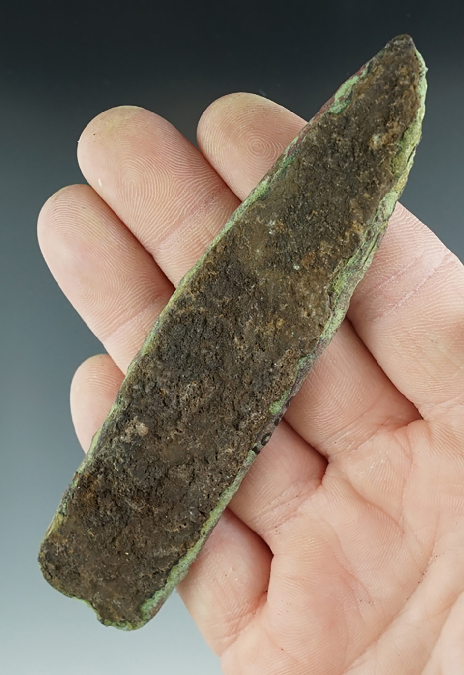 4 7/16" Old copper culture spear point found in Dodge Co., Wisconsin.