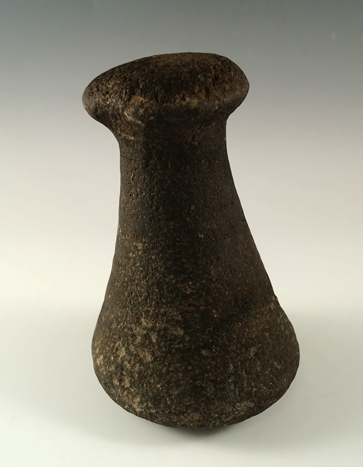 5 3/8" nicely styled and well patinated Poi pounder made from basalt found in Hawaii.
