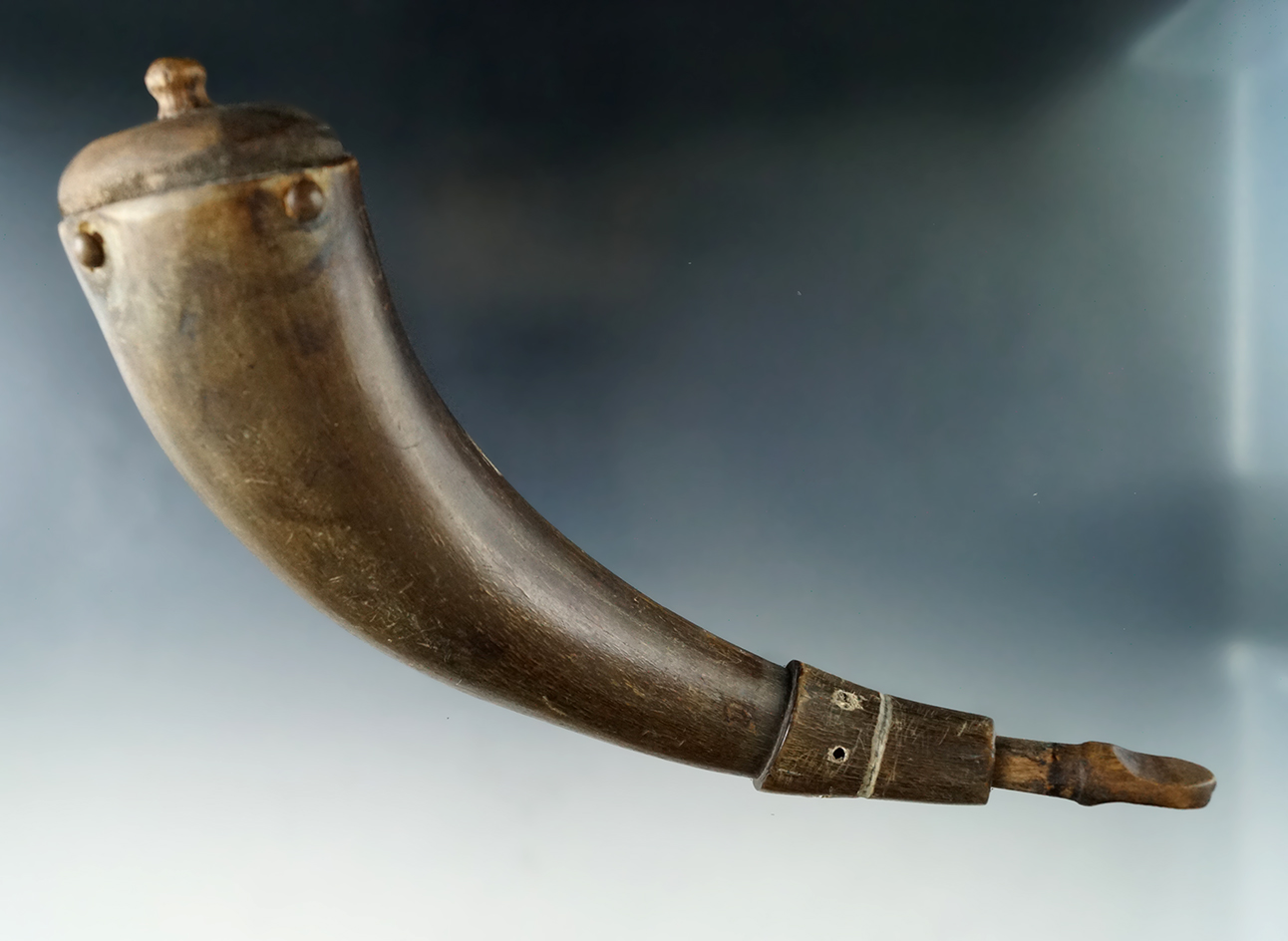 7" long circa 1800s Powder horn with original wood stopper.