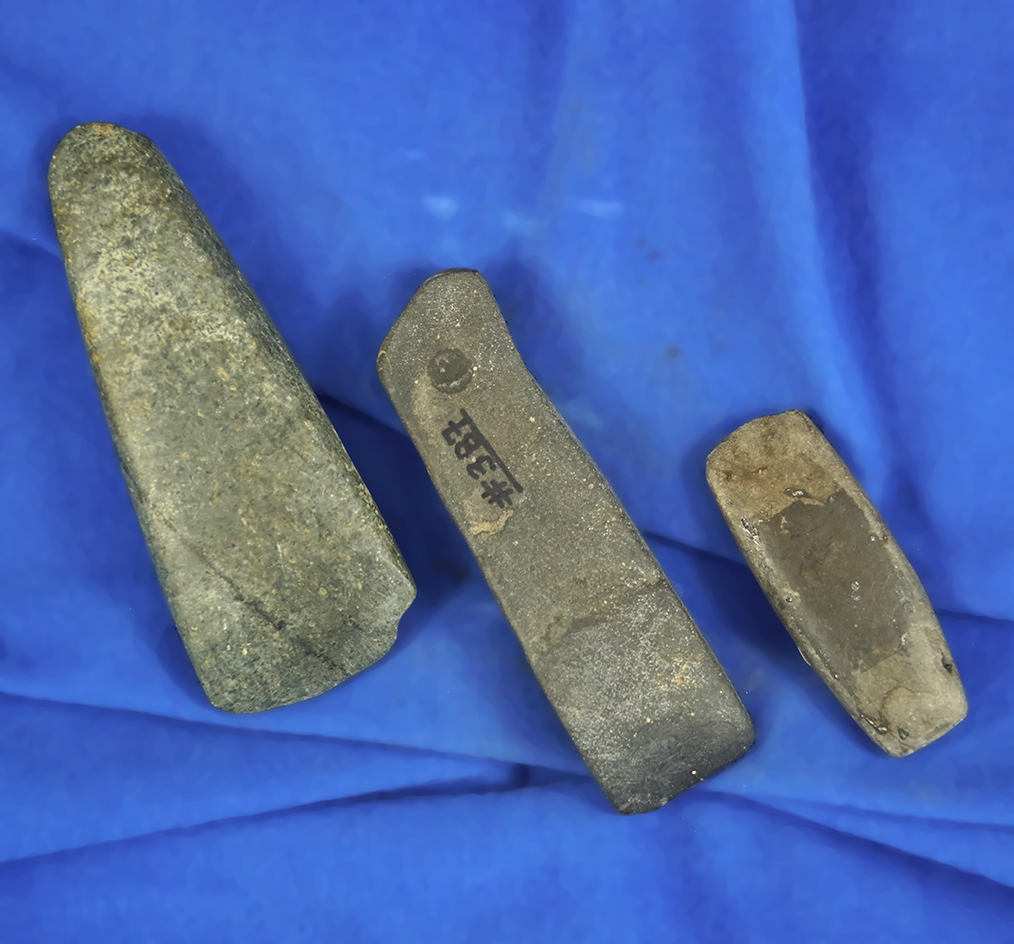 Set of three nice Adena stone Celts and chisels, largest is 3 3/4" found in Michigan.