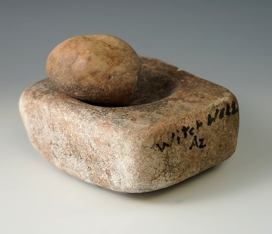 4 1/4" long cupped medicine pallet and grinding pestle found in Witch Well, Arizona.