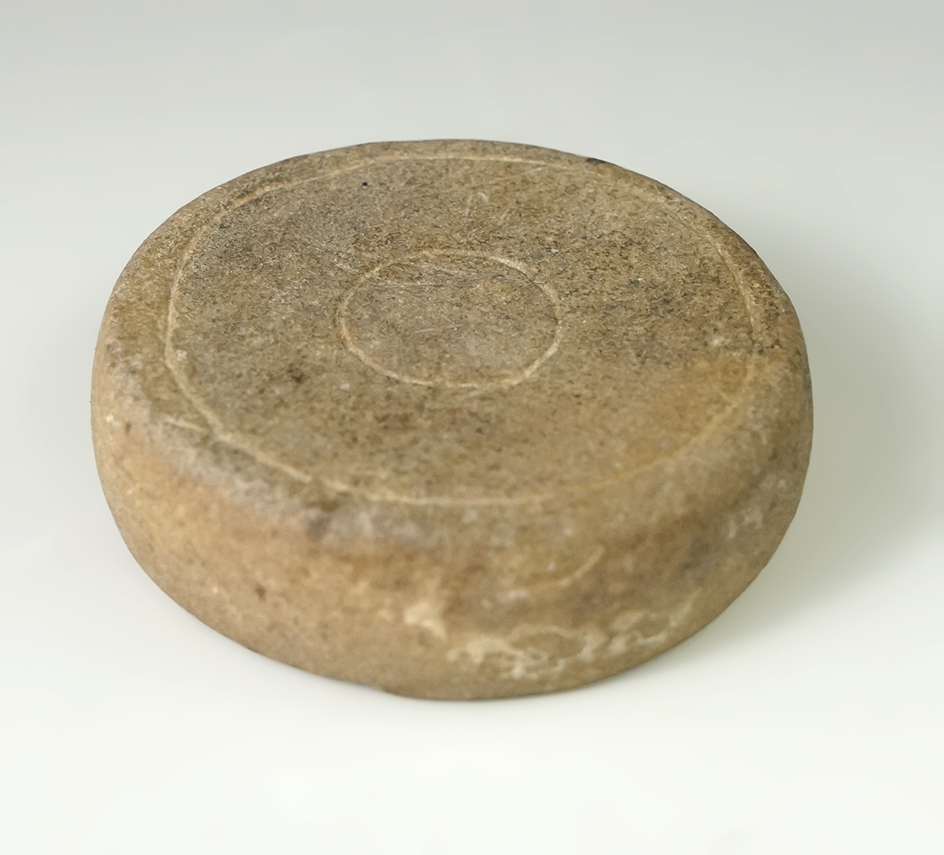 2 1/8"Fort Ancient engraved sandstone disc found in Ross Co., Ohio. Ex. Robert Converse.