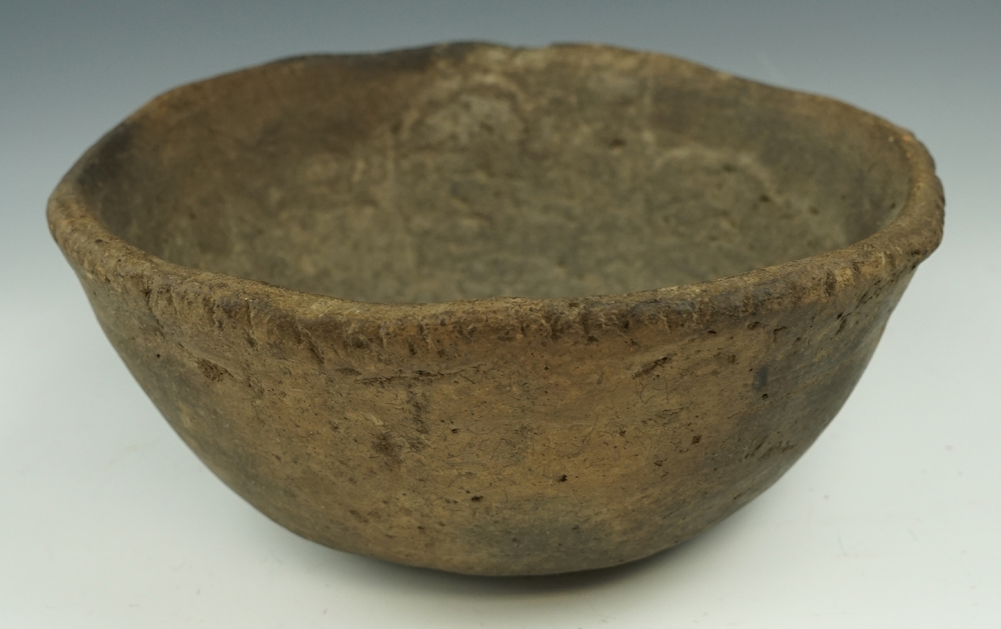 8" Wide Mississippian pottery bowl with a piecrust rim found near Eva Dale, Mississippi Co., AR.