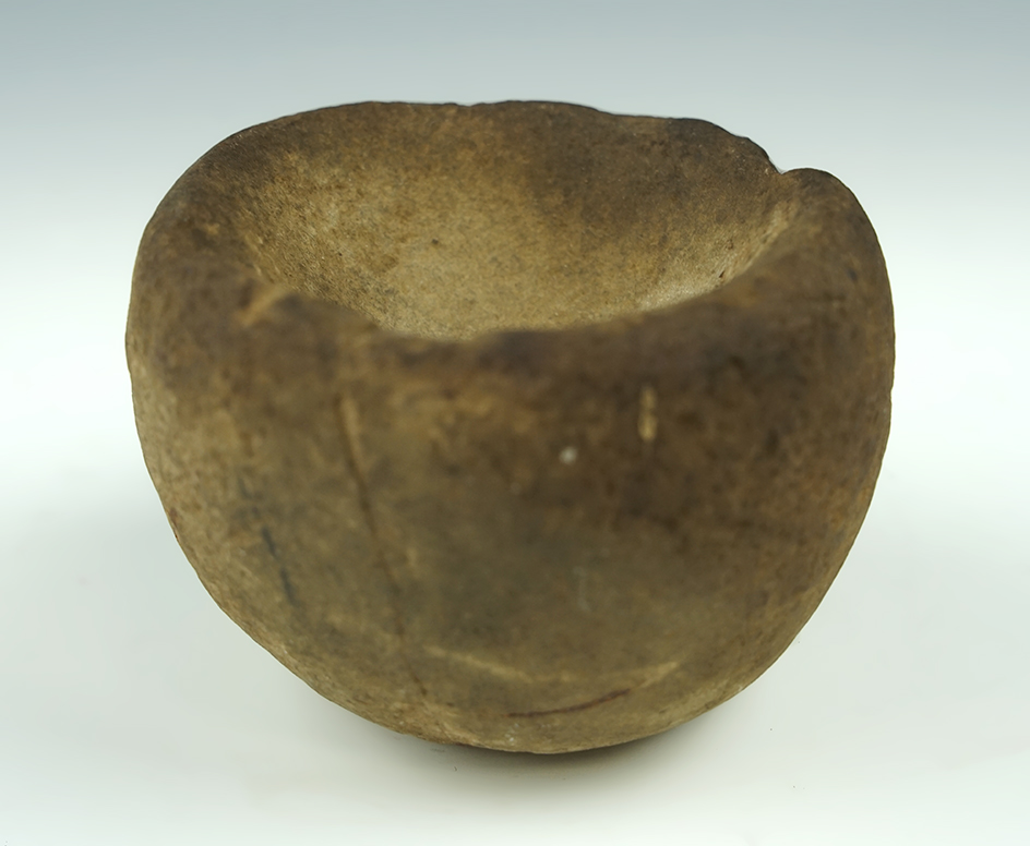 3" wide by 2 1/8" tall stone medicine bowl that is well styled and heavily patinated. D75