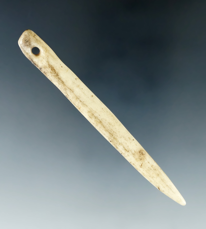 3 11/16" nicely polished perforated bone awl or needle found in Tennessee.