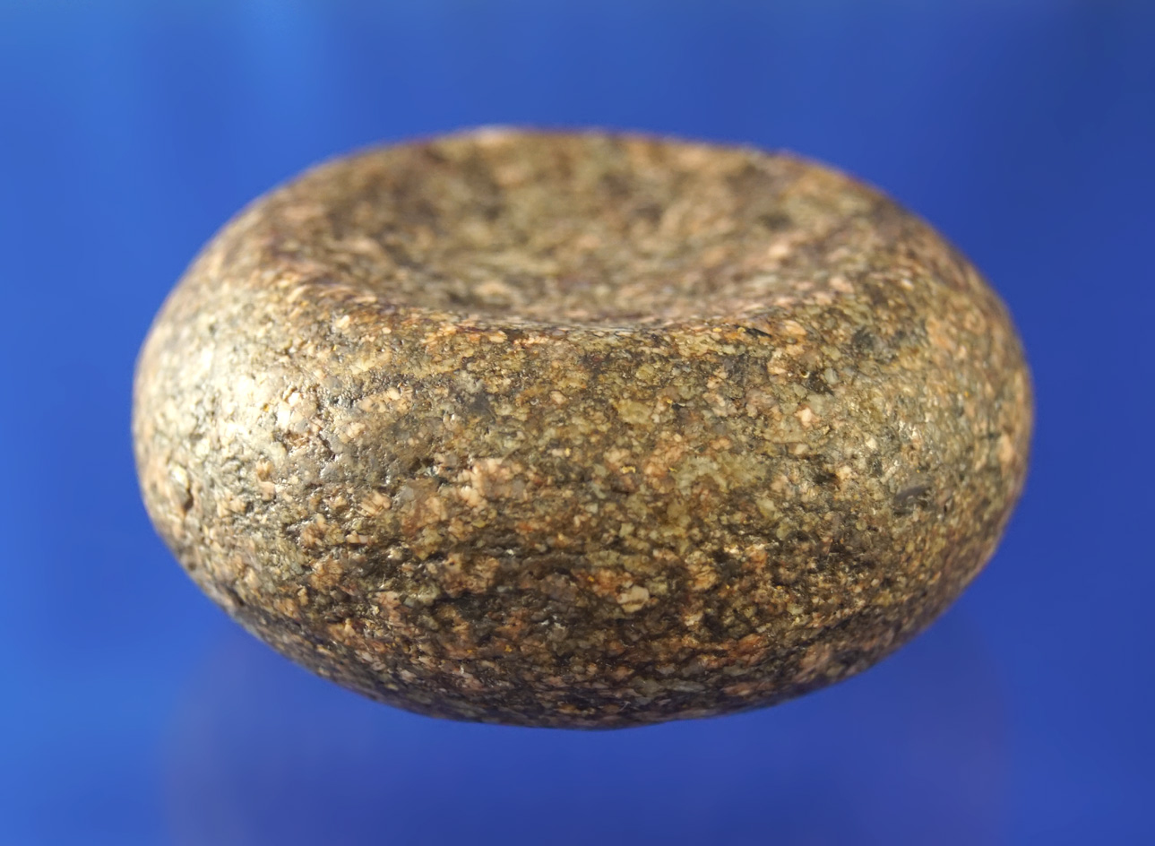 2 1/2" double cupped speckled granite Discoidal - nice overall polish found in Illinois. Dickey COA.