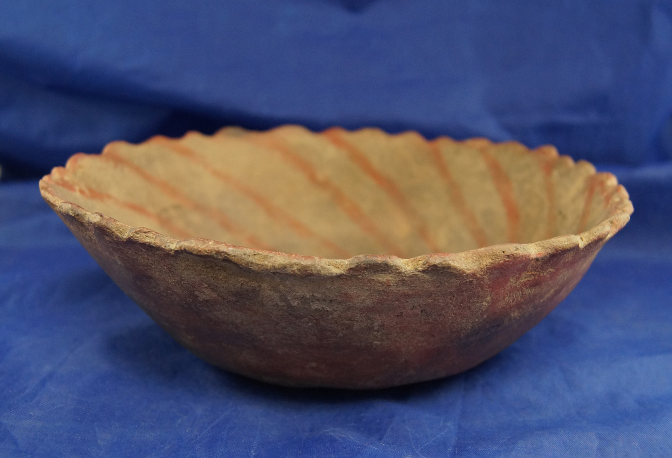 8 5/8" Wide nicely decorated Pie Crust Bowl that is painted on the interior. Found in Scott Co., MO.