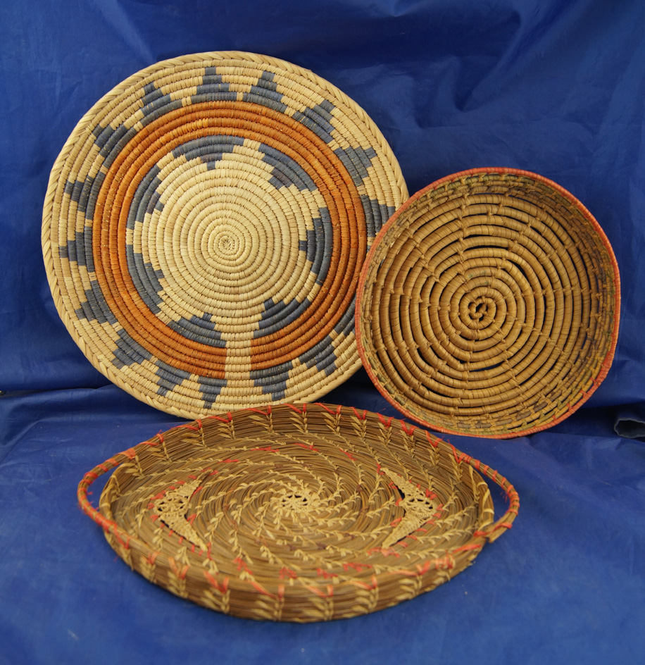Set of 3 Contemporary Baskets, largest is 11 1/2" diameter.