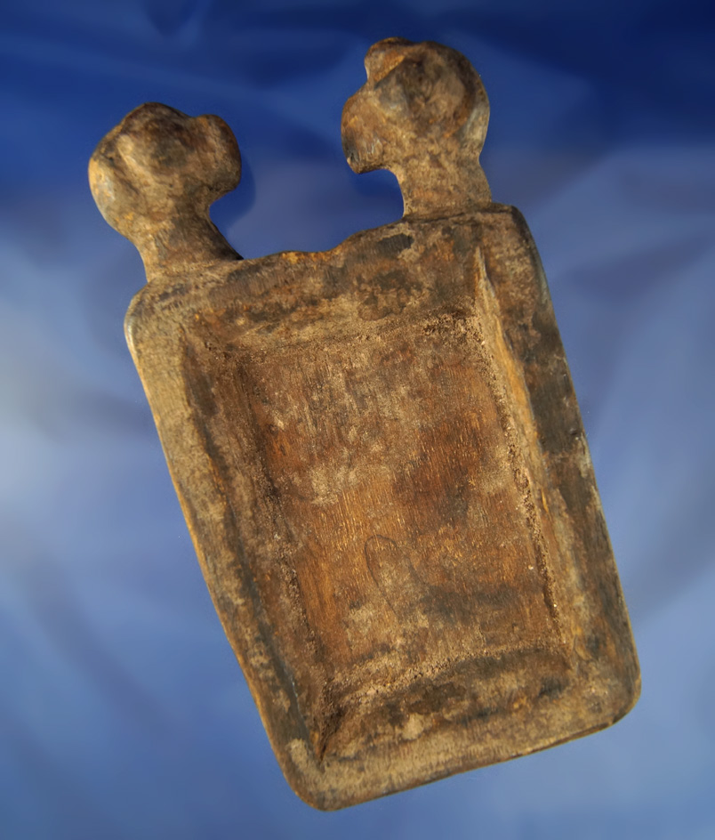 6 1/2" long ancient hand carved wooden matrimonial pallet with condor heads. Wari culture, Peru.