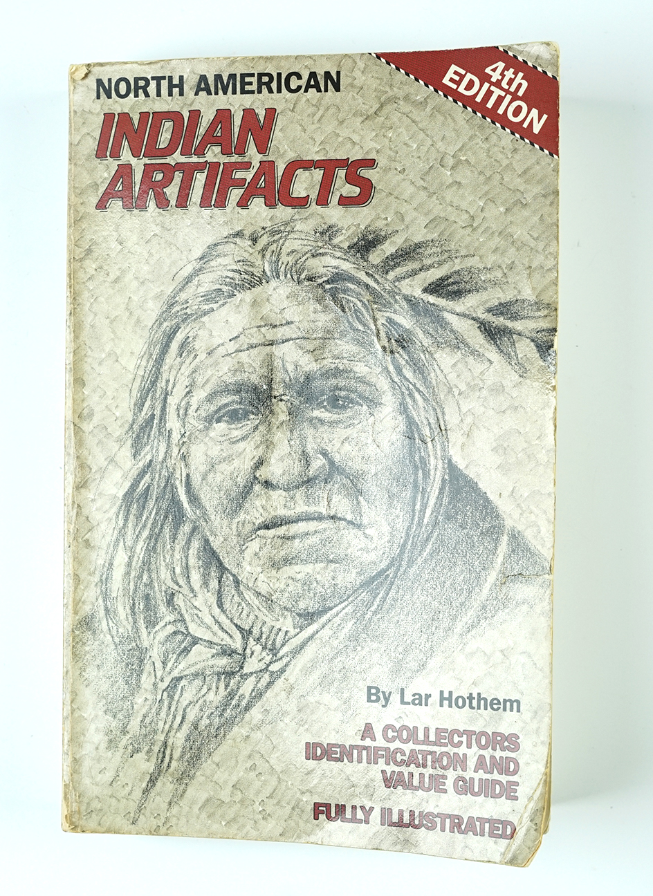 Softcover Book: "North American Indian Artifacts" 4th edition by Lar Hothem. In fair condition.