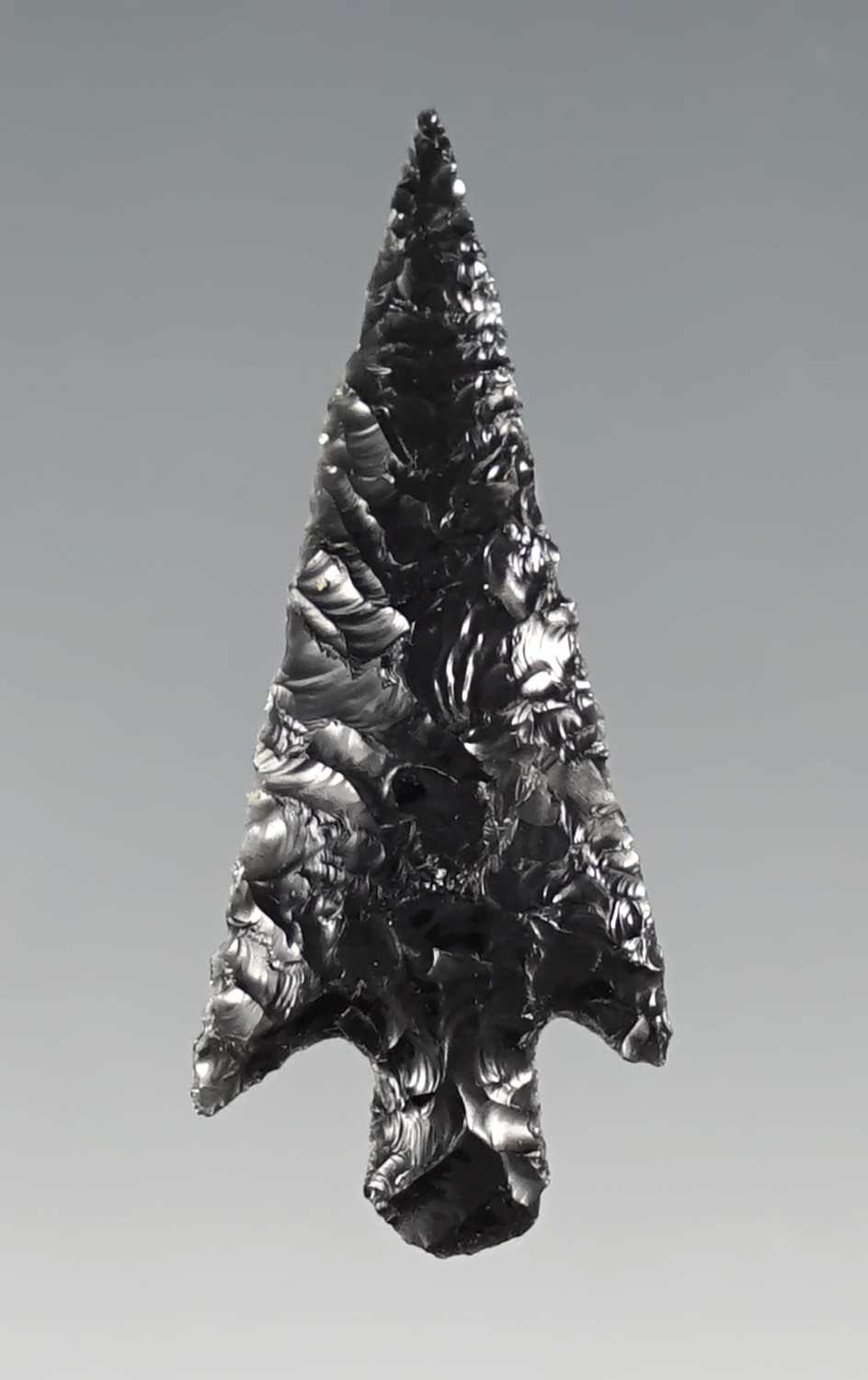 1 1/4" beautifully flaked Obsidian Rose Springs Cornernotch. Oregon. Ex. Lynn Woodcock.