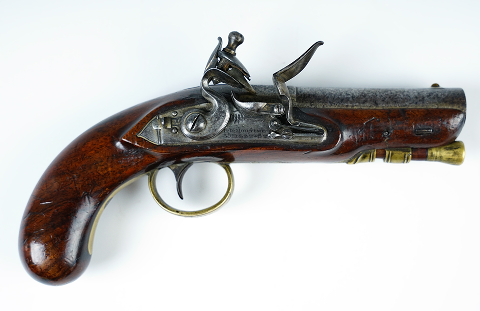 Small flintlock pistol, English made. 3" barrel, 50 cal. Stamped "H.W. Mortemer, 89 Fleet-St.".