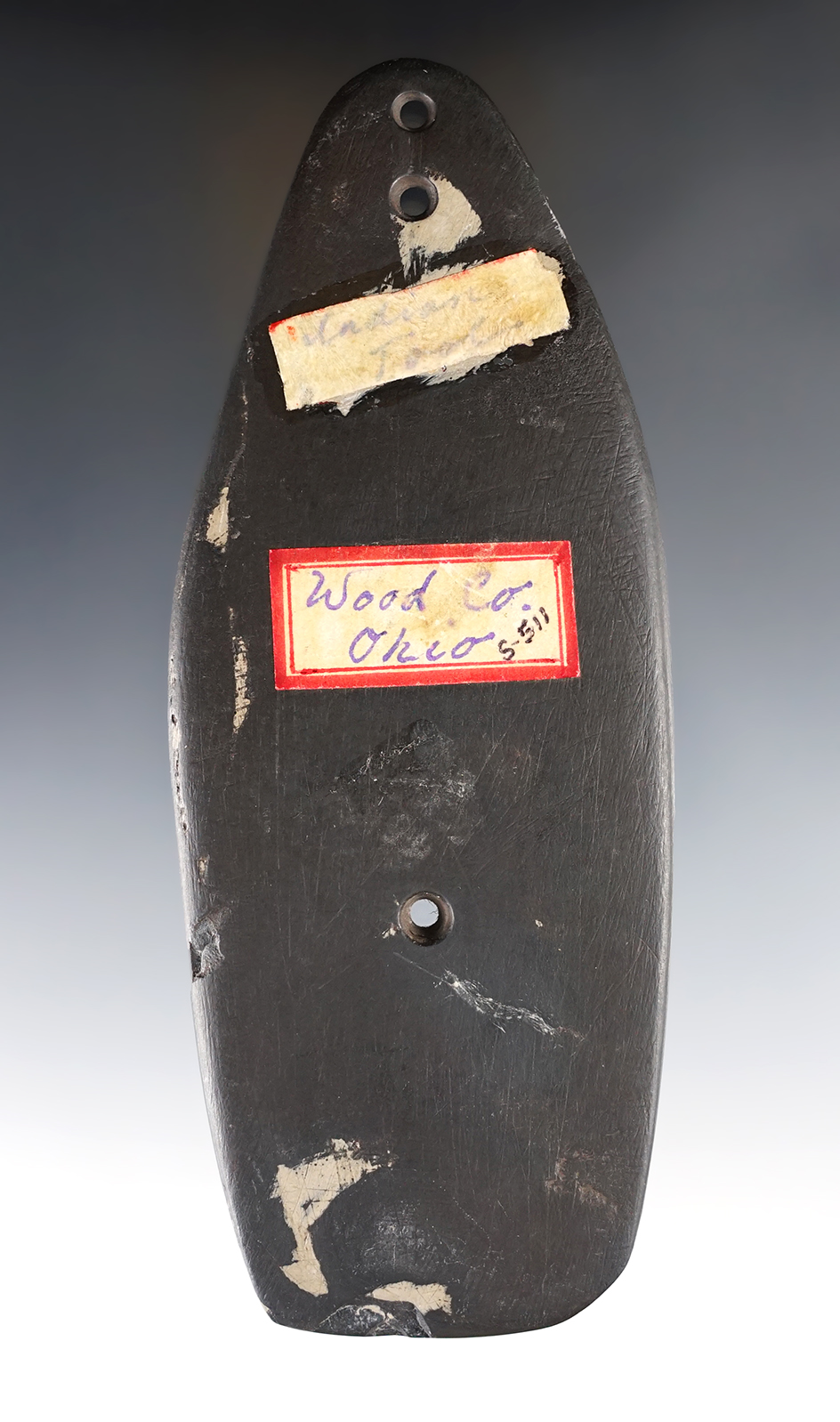 6 1/8" black slate three hole Glacial Kame Sandal Sole Gorget. Found in Wood Co., Ohio.