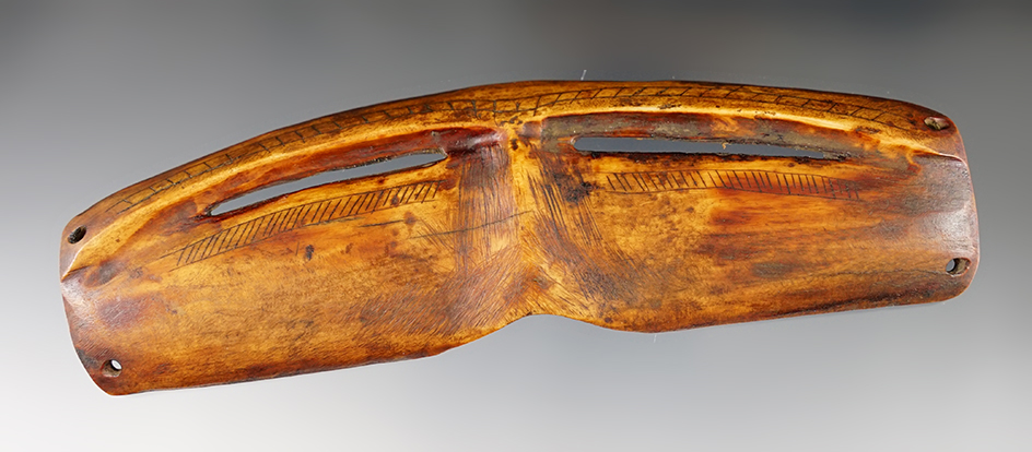 Nicely styled 5 1/2" Inuit bone snow goggles with excellent engraving. Found in Alaska.