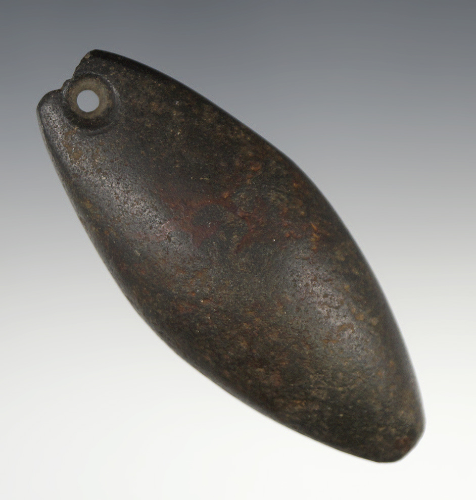 Well patinated and nicely styled 3 1/4" Drilled Plummet found in Missouri.