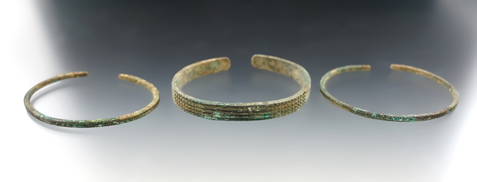 Set of three copper bracelets, largest is 2 3/8" recovered from a site in New York.