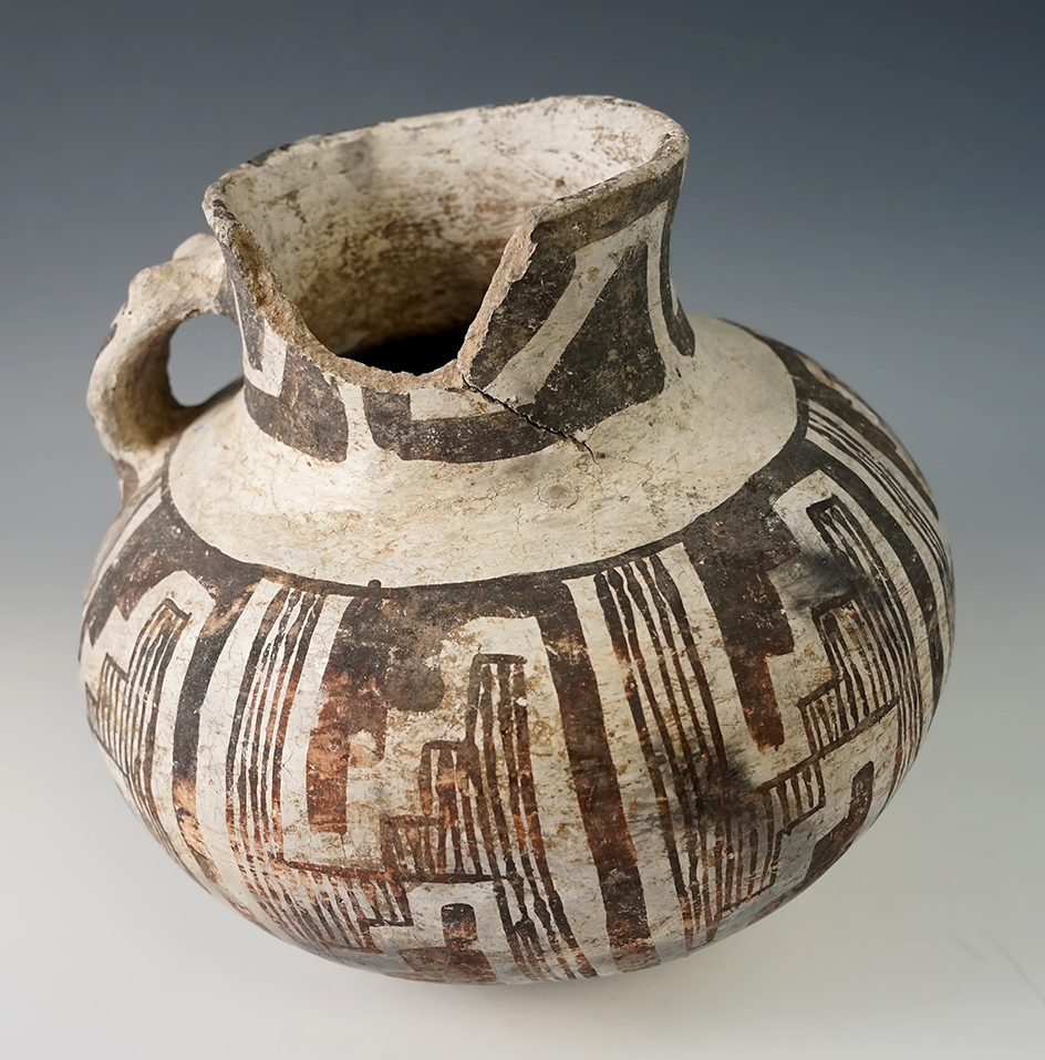 6 1/4" tall by 7" wide Anasazi black and white pottery pitcher found in New Mexico.