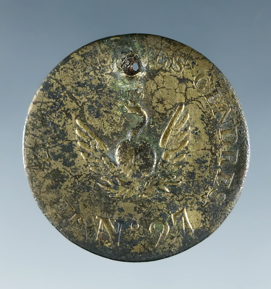 1" Phoenix button (#27) that's been punched for suspension. This is a large Phoenix button!